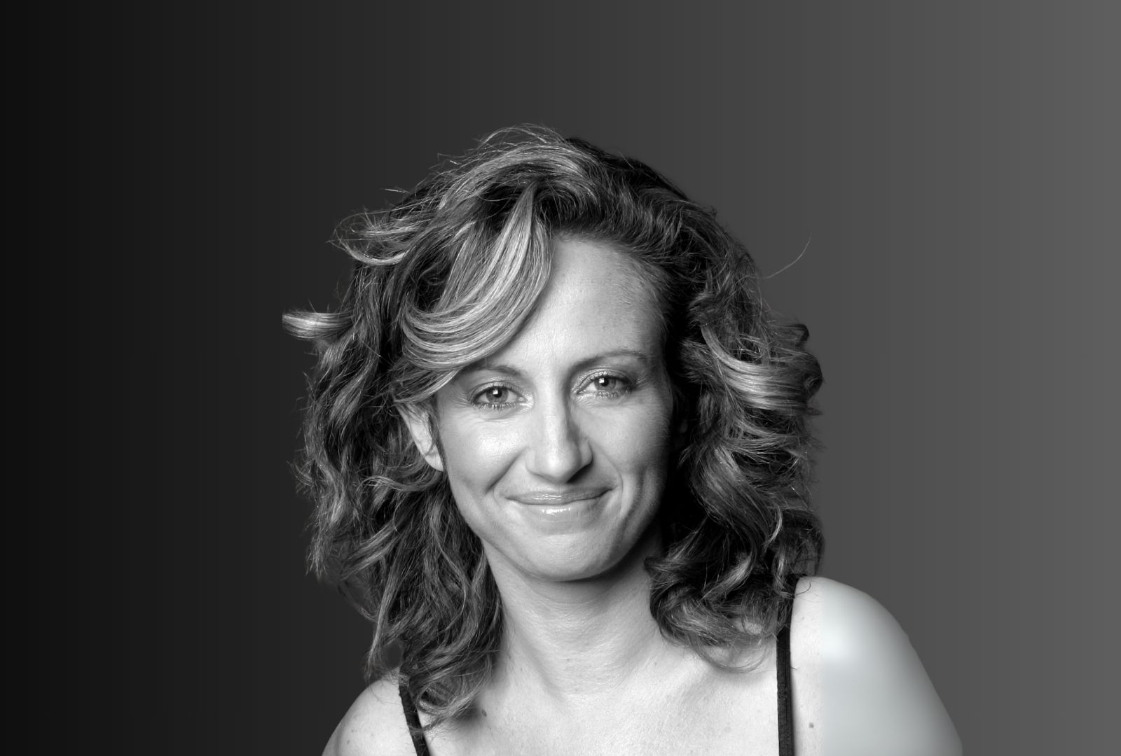 Cristabel Sved headshot in black and white.