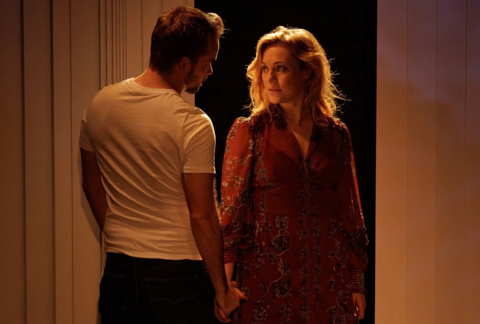 Two actors staring intensely at each other.