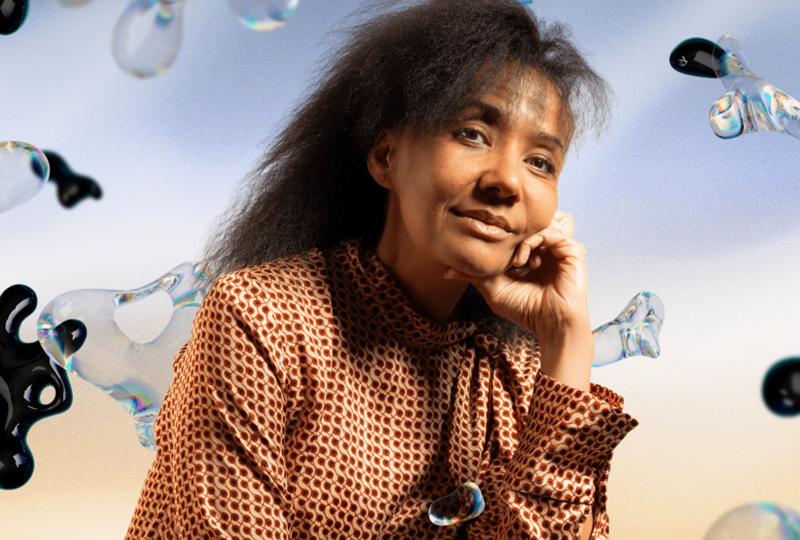 Paula Arundell in the Griffin Theatre's production of 'Nucleus' surrounded by colourful bubbles.