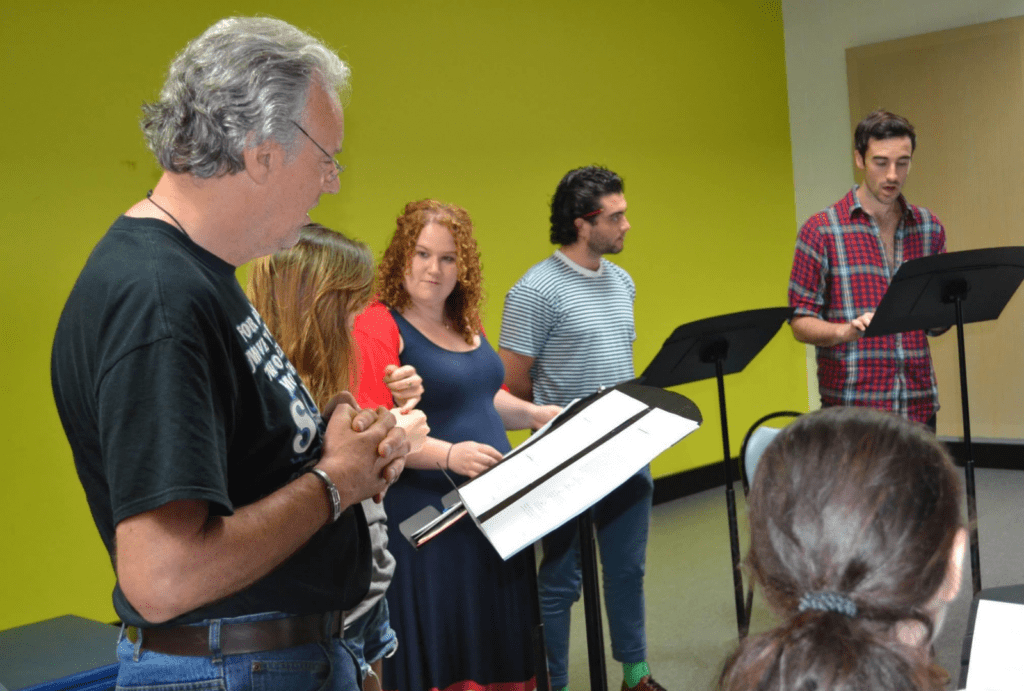 Jessica and coworkers in rehearsal